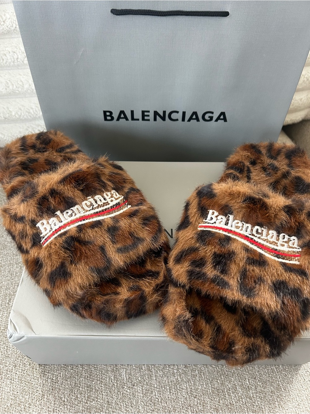 Footwear-like fuzzy slides